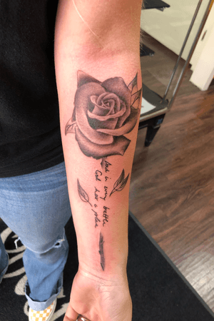 Black and grey memorial piece. Loved ones handwriting incorporated into rose. 