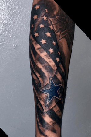 Cowboys/American flag tattoo