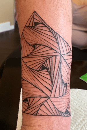 The start of Lukes sleeve. This #amulettattoo is made up entirely of triangles. Isnt that an insane optical illusion?!? #geometrictattoo 