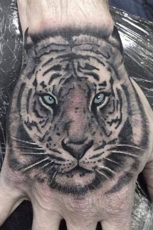 Tiger hand tattoo job stopper 