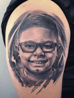 Portrait of his son wearing Oakley glasses #portrait #blackandgrey #realism #tattooartist #maxwellrivera
