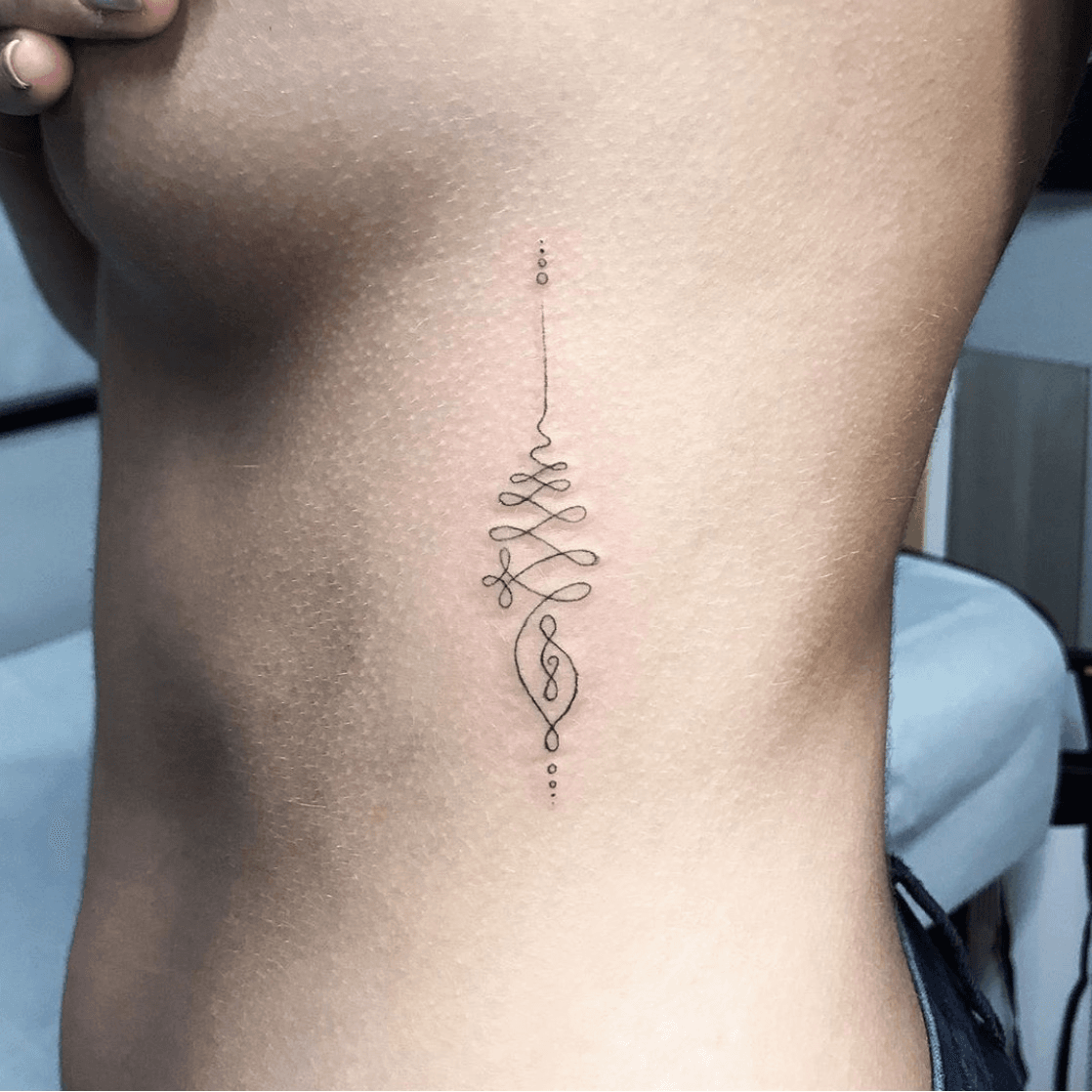 11 Single Needle Tattoo Ideas Every Minimalist Will Love  YourTango