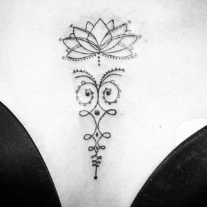 Chest lotus tattoo