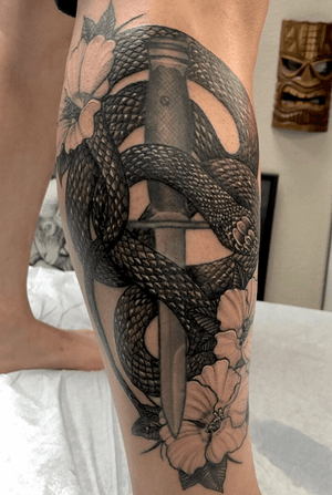 Wrapped this snake and flowers around this existing dagger.  Happy how this turned out.  Booking for July and August.  Thanks 🤙🏽. #peaces #snaketattoo #blackandgrey #tattoo #inkedlife #guyswithtattoos #girlswithtattoos #scales #empireinks #bng #blackwork #fullerton #oc #tatted #inked #blessed #hustle