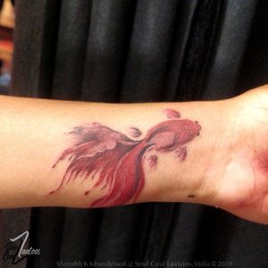 Coloured Fish tattoo #tattoo #tattoosforgirls #tattooideaformoms #tattooideas #wheredelhigetsinked