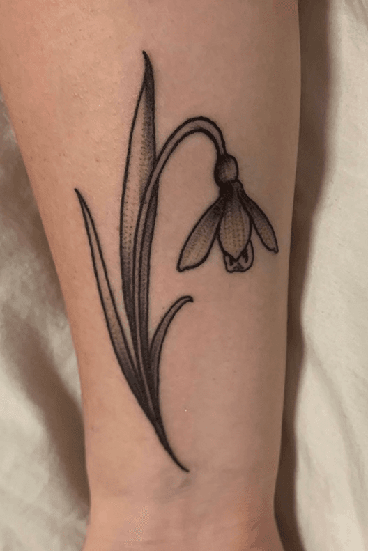 snowdrop flower and dagger tattooTikTok Search