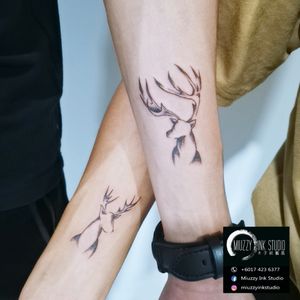 Deer couple tattoo