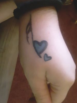 Musical heart Black web ink in Corydon Indiana done my tattoo the guy who done it no longer works there but there a great shop I love them 
