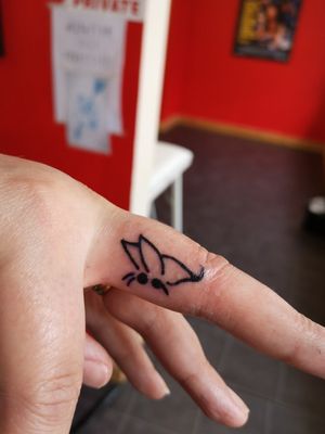 Custom finger tattoo 