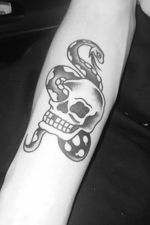 Traditional skull and snake combo