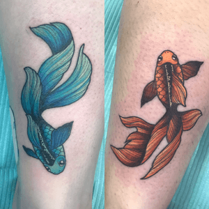 Custom colored matching tattoos - back of ankles 