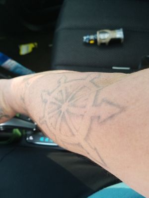 This was supposed to be a large thick 8 pointed star of chaos. I let him convince me that his free handed negative space would be much better for the sleeve we had planned. 