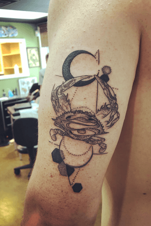My first tattoo! Blue crab with geometric shapes in the background. 