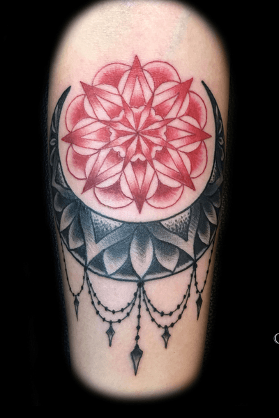 Mandala with decorative accents and color work