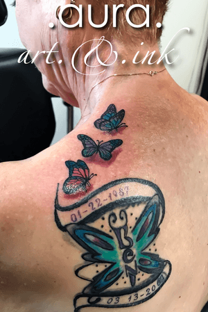 Coverup memorial and floating butterflies with ashes in the grey and black.