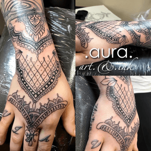Ornamental henna inspired hand tattoo.