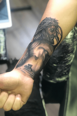Jesus forearm tattoo 