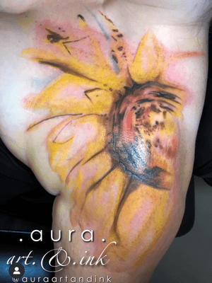 Large watercolor sunflower shoulder tattoo.