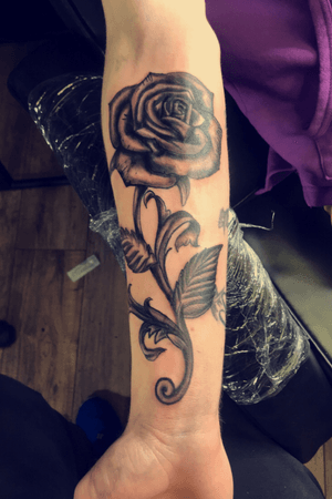 Rose tattoo on forearm 