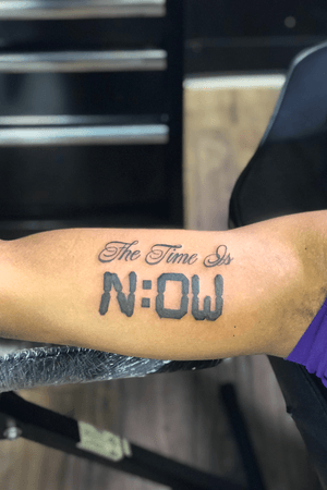 “The time is now” bicep tattoo 