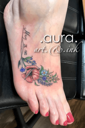 Fine line, floral foot tattoo.