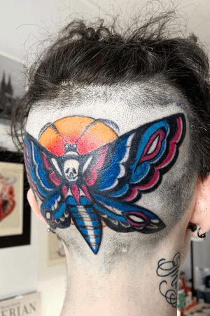 Head tattoo butterfly