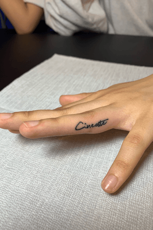 finger lettering tattoo