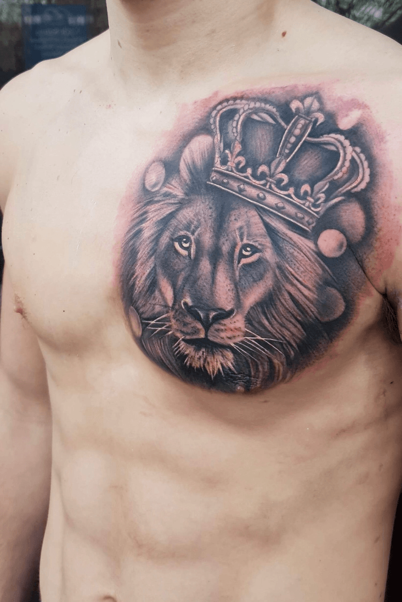 lion with crown chest tattoo