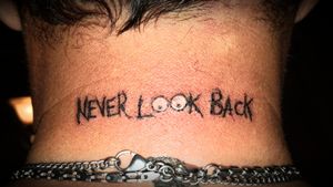 #neverlookback #blackwork #letteringtattoo #eyes 