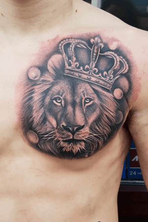 My first ever tattoo. Lion with crown on head on left pec, over my heart. #Lion #ChestTattoo #ChestPiece #King #Realism