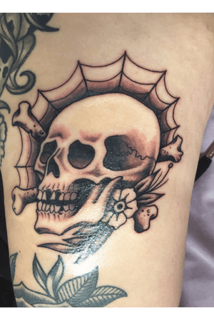 Old school skull and spiderweb by rupert cleaver in electric punch