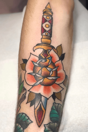 Trad rose and dagger by @squiretattooer