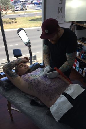 Working at link tattoo shop 