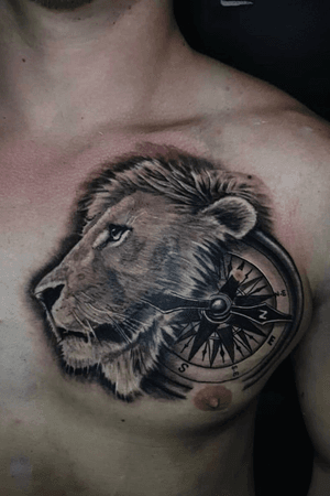Lion and compass by @hobotattoo