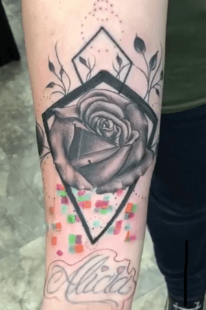 Geometric rose tattoo with abstract flavor 