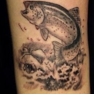 Lots of detail in this small wrist tattoo of a rainbow trout jumping from water that I did 