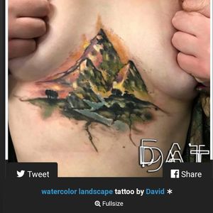 Watercolor mountain range underboob chest tattoo