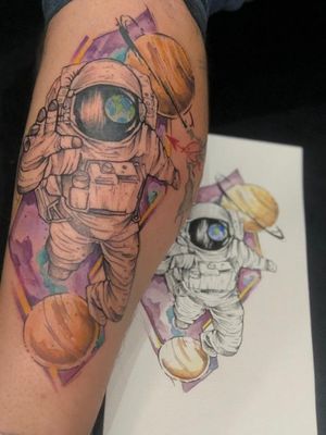 Astronaut looking to Earth #earth #astronaut #planets #watercolortattoo #dotworktattoos 
