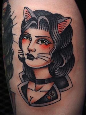 Cat tattoo by Mick Gore #MickGore #cattattoos #cattattoo #cat #kitty #cute #animal #petportrait #pet #catlady #pawprint #catears #portrait #traditional #color #arm