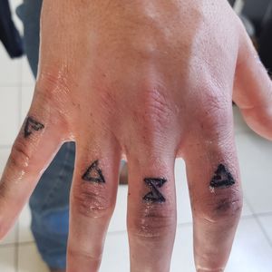 Finger Symbol Tattoo