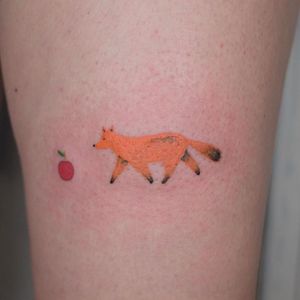 Cute tattoo by Victor Zabuga #VictorZabuga #cutetattoos #cute #sweet #tattoosforgirls #tattoosforwomen #tattooideas #cooltattoos #love #fox #apple #handpoke #animal #small #color #leg