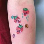 Cute tattoo by Charline Bataille #CharlineBataille #cutetattoos #cute #sweet #tattoosforgirls #tattoosforwomen #tattooideas #cooltattoos #love #arm #strawberry #smileyface #flowers #small #color