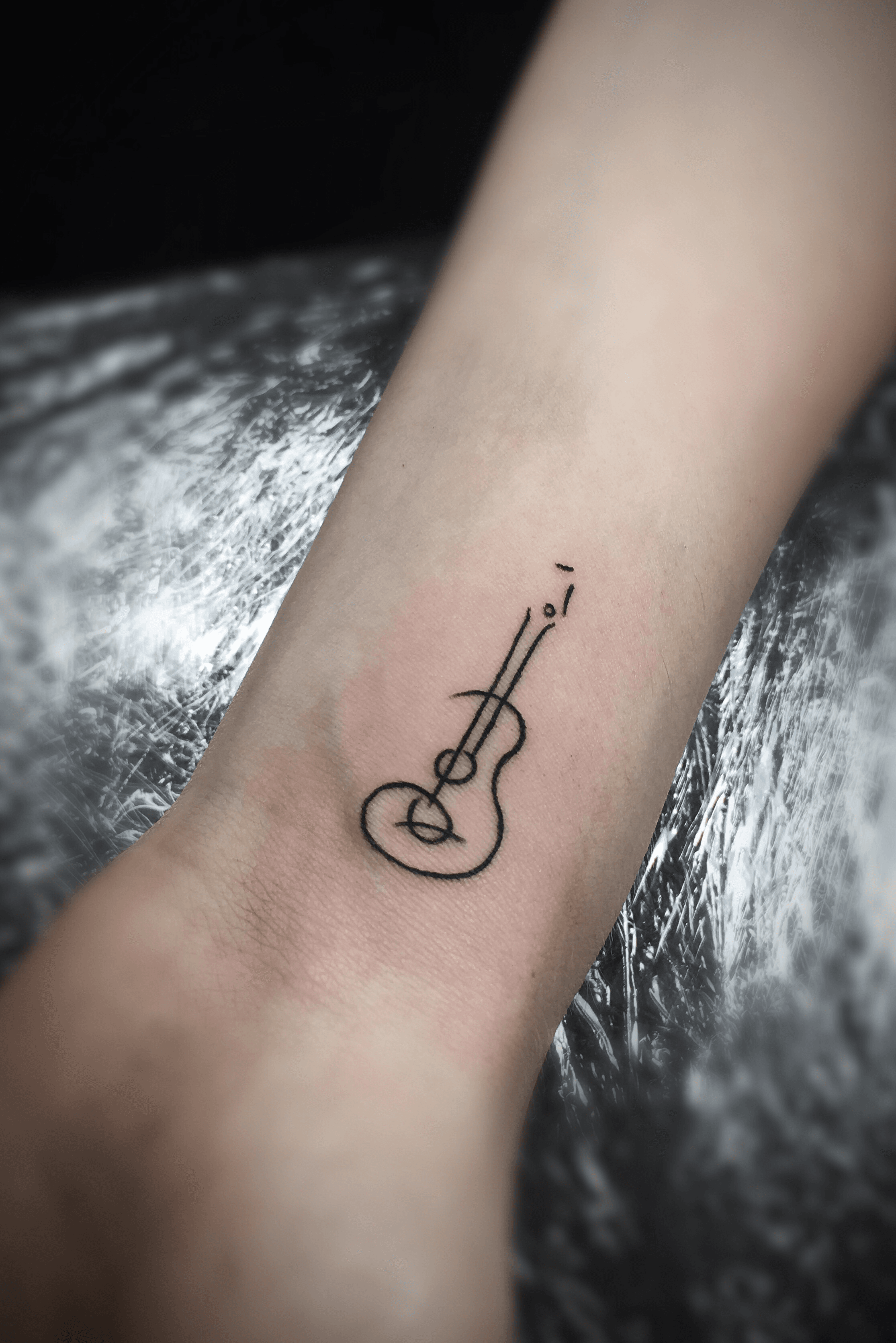 Tattoo uploaded by Barabas Joco  Small guitar tattoo  Tattoodo