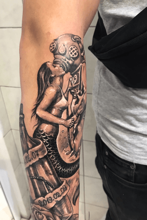 The marmaid’s kiss. Marine sleeve tattoo