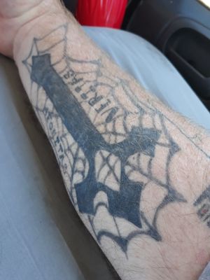 Spider web I did to hide the fact that another artist messed up on the cross and letters $15 As my bio States I've only been doing this a year. Most of my pricing is fairly on the lower side. I am mobile and depending on your location there will be no charge if I do charge you it's an extra $25. Just like I tell all my clients if you refer you get half off on your next tattoo feel free to send me a text at 209-214-3751 please do not call I have a lot of scam likely or robocalls so please text I respond faster