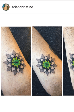 The start of a forearm mandala piece with dotwork and color