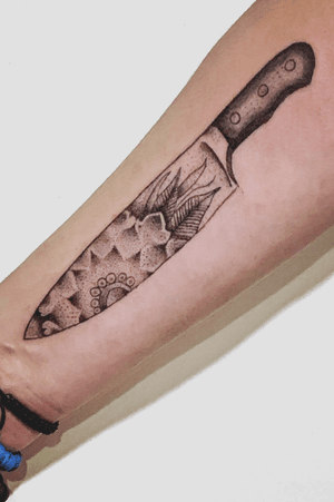 Knife tattoo with dot technique 