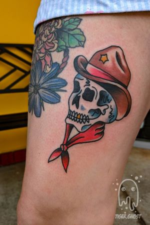 Traditional cowboy skull on the inner thigh