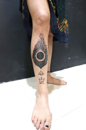 Dark sun tattoo with some alchemy symbols for Ciel