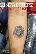 Simple lion tattoo